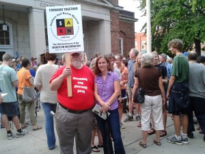 SARN treasurer Dick Paddock and secretary Anne Wolfley attend the “Taking the Dream Home to Chapel Hill” rally in downtown Chapel Hill  (August 28, 2013).